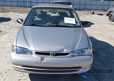 2000 Toyota Corolla Ce из США, поврежденный, VIN 1NXBR12EXYZ374760